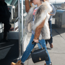 Exclusive - Rihanna Catches A Flight Out of NYC