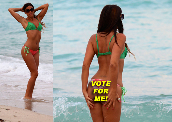 Claudia Romani in a watermelon colored bikini at the beach in Miami