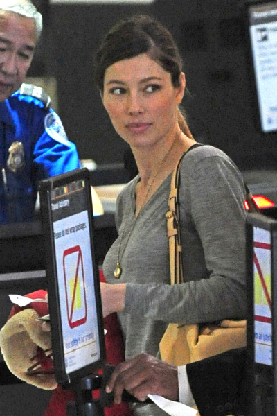 **EXCLUSIVE** Jessica Biel seen at LAX Airport as she waits in a line with her luggage
