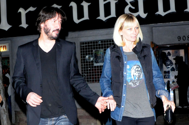 KEANU'S LADY?? Actor Keanu Reeves leaving The Troubadour while holding hands with a female companion after attending the 'METZ' rock show in West Hollywood