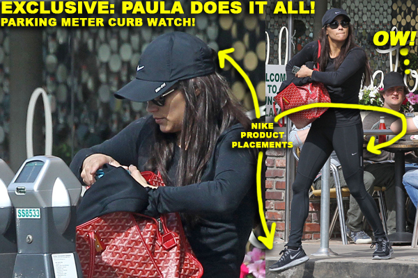 **EXCLUSIVE** Paula Patton covers her belly with a purse as she feeds the parking meter before heading into the gym