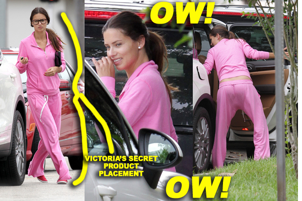 **EXCLUSIVE** Adriana Lima stays bright in a pink track suit as she heads out on a rainy day in Miami