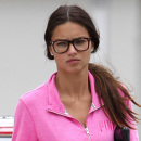 **EXCLUSIVE** Adriana Lima stays bright in a pink track suit as she heads out on a rainy day in Miami