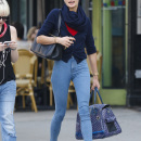 Australian model Jessica Hart carries her oversized bag while out with a female pal in the East Village in New York City