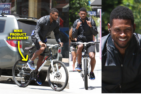 **EXCLUSIVE** Usher gives his best kung-fu move as he takes a bike ride along with a friend in Los Angeles