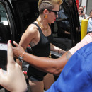 Miley Cyrus arrives at the Y100 Mack-A-Poolooza pool party in Miami with her mom and 13 year old sister Noah