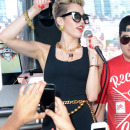 Miley Cyrus Shows Off Some Major Leg In Miami