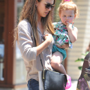 Jessica Alba heads to a beach party after shopping for toys with her daughters