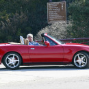 **EXCLUSIVE** Jay Leno drives a red supercharged Mazda Miata convertible while filming scenes for a commercial in LA