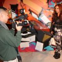 Kayla Collins Interviewed By TMZ’s Yori Uehara at WhatTheFunny.com Christmas Party