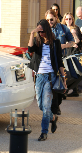 Zoe Saldana leaving Barneys New York with her husband Marco Perego following a last minute Christmas shopping spree in Beverly HIlls.