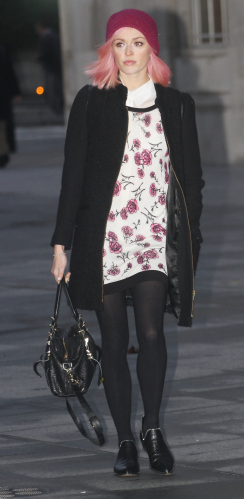 Fearne Cotton arrives at the BBC Radio 1 studios on Christmas eve wearing a festive floral print dress and beanie hat