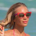Laura Cremaschi in a pink thong bikini at the beach in Miami