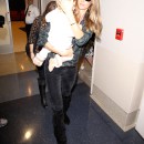Supermodel Gisele Bundchen and daugher Vivian departing on a flight at LAX airport in Los Angeles, California on February 9