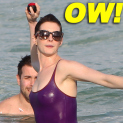 Anne Hathaway - wearing a swimsuit and shorts addsfsa