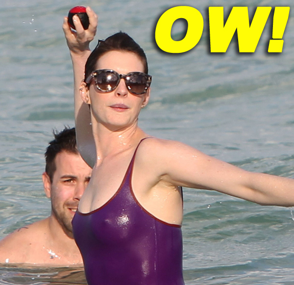 Anne Hathaway - wearing a swimsuit and shorts addsfsa