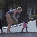 Charlize Theron gets a visit from son Jackson while on a photo shoot in Miami Beach