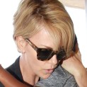 Charlize Theron & Son Jackson Catch A Flight Out Of LAX!