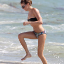Actress Katie Cassidy seen enjoying a dip in the ocean before heading back to her hotel in Miami Beach