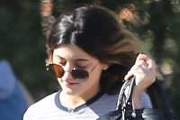 Kylie Jenner Gets Camera-Shy While Wearing Barely-There Short-Shorts