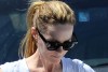 BREAKING! Leslie Mann Holds Her Coffee, Wallet & Paper Bag While Opening SUV Door!