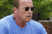 Arnold Schwarzenegger Rides A Monster-Wheeled Bike With Girlfriend Heather Milligan