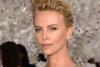 PARIS: Charlize Theron Brings Along Sean Penn To The Christian Dior Fashion Show
