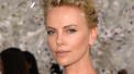 PARIS: Charlize Theron Brings Along Sean Penn To The Christian Dior Fashion Show