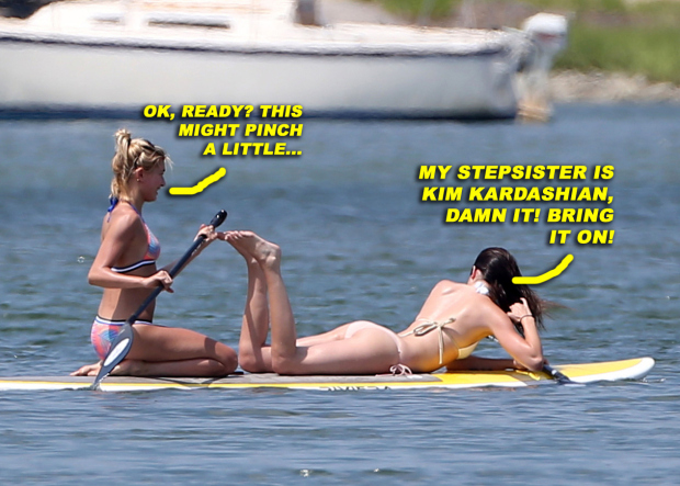 Kendall Jenner rocks a bikini as she goes paddleboarding with a friend in the Hamptons