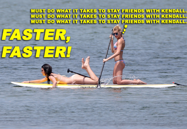 Kendall Jenner rocks a bikini as she goes paddleboarding with a friend in the Hamptons