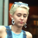 BREAKING! Miley Cyrus Drops Her Chanel Earring At The Gas Station!