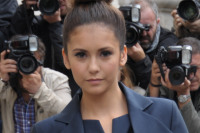 Nina Dobrev’s Paris Fashion Week Leg Show Continues