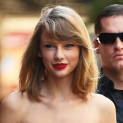 Taylor Swift Leggy At Night, But Covers Up While Out With Family