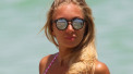 Bikini-Clad Laura Cremaschi Helps Elderly Man At The Beach!