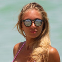 Bikini-Clad Laura Cremaschi Helps Elderly Man At The Beach!