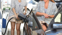 Kelly Brook is All Smiles Pumping Her Own Gas