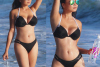 Abby Cubey Does A 138 Water Bikini Beach Photoshoot