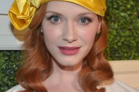 Christina Hendricks Uses Odd-Looking Head Gear To Divert Attention From Quadruple Ds