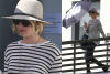 Jennifer Lawrence Shades Herself With A Middle-Finger Umbrella