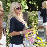 Miami Beach: Victoria Silvstedt Reads OK! Magazine Poolside!!