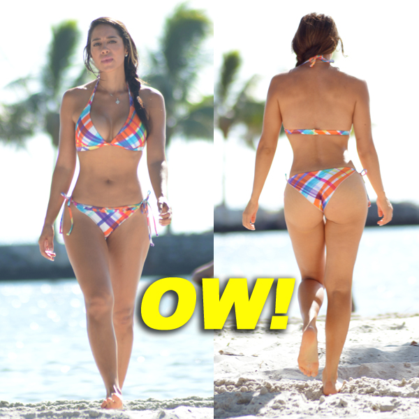 Popular sports model Andrea Calle puts on a show with a tiny bikini and some lotion