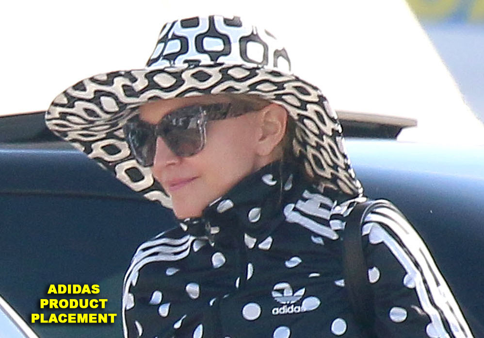 Semi-Exclusive... Madonna Boards A Yacht In Cannes