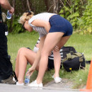 137821, EXCLUSIVE: Margot Robbie seen wearing high waist denim shorts while practicing some of her stunt scenes for Suicide Squad. She is seen rehearsing jumping of the bike while it was sliding down the street and jumps off in front of the Joker's car and forces him to stop. She wiped out a few times while rehearsing. Margot plays Harley Quinn in Suicide Squad. Margot also had a suspicious ring on her wedding finger. CANADA OUT Photograph: © PacificCoastNews. Los Angeles Office: +1 310.822.0419 sales@pacificcoastnews.com FEE MUST BE AGREED PRIOR TO USAGE